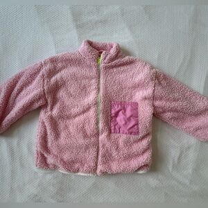 Pink Fleece zip up sweater with cotton inner lining. 6 years old
